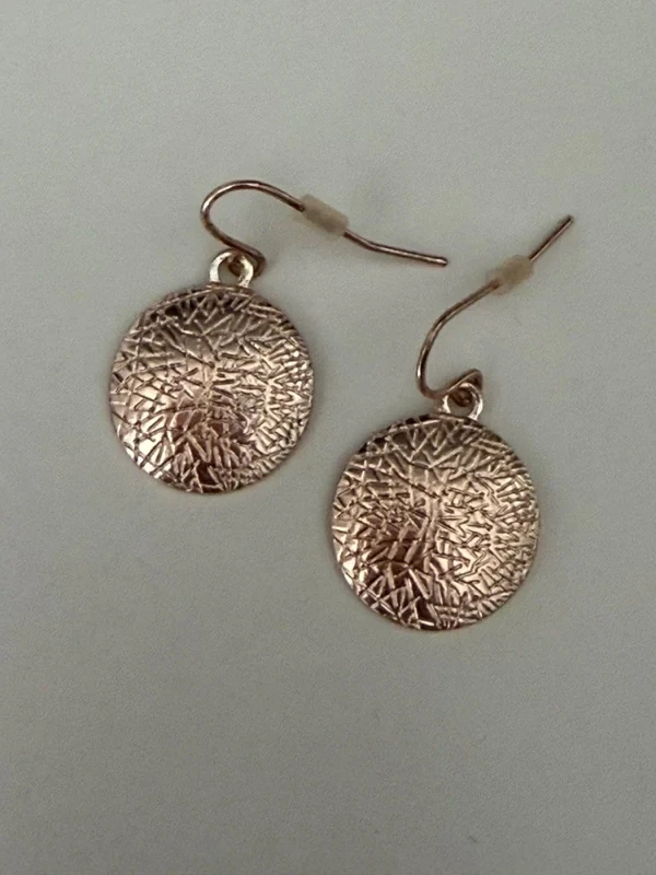 Rose gold medal earrings